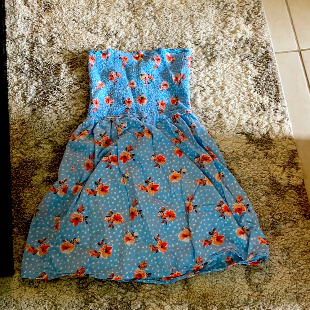 This is a very cute strapless dress with flowers